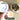 A hand holds a small white cup of pale tea over a wooden table, with a bowl of loose dried tea leaves and stacked teacups nearby. Large text reads 'LAST CHANCE Get them before they're gone.