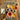 A wooden table with tea tray and white teacups filled with different colored teas, and loose tea leaves in bowls, a notebook pen. Text at the top reads 'POPULAR Try our most-loved teas' and a 'SHOP NOW' button
