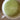 Top-down image of matcha in a white mug