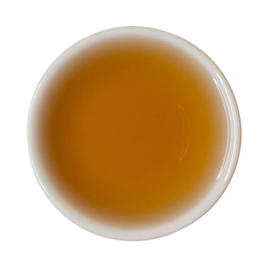 Steeped cup Many Moons rock oolong tea