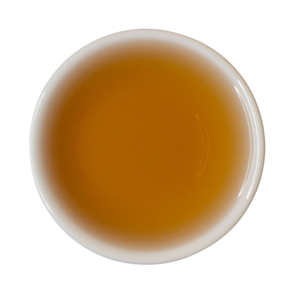 Steeped cup Many Moons rock oolong tea