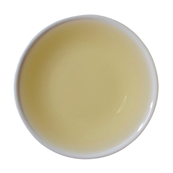 Steeped cup Whispering Cave white tea