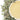 White tea leaves with a pale cup of tea. Large bold text at top is WHITE TEA and bottom text in green button says LEARN MORE.